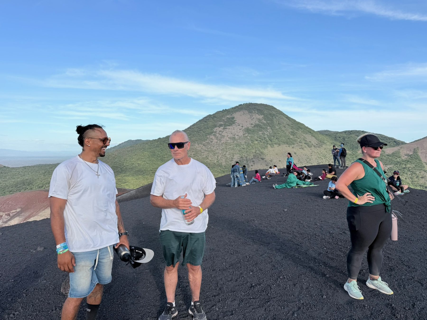 Team standing on the cinder-cone summit